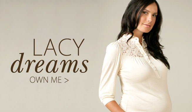 Maternal America adds feminine texture with a delicate lace yoke and soft sleeves. The perfect smart casual look.